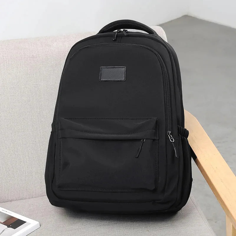 Mochila Unissex de Grande Capacidade para Viagem e Escola — Modelo Casual em Cor Sólida
