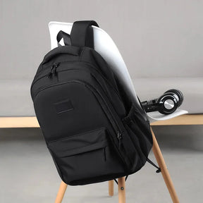 Mochila Unissex de Grande Capacidade para Viagem e Escola — Modelo Casual em Cor Sólida